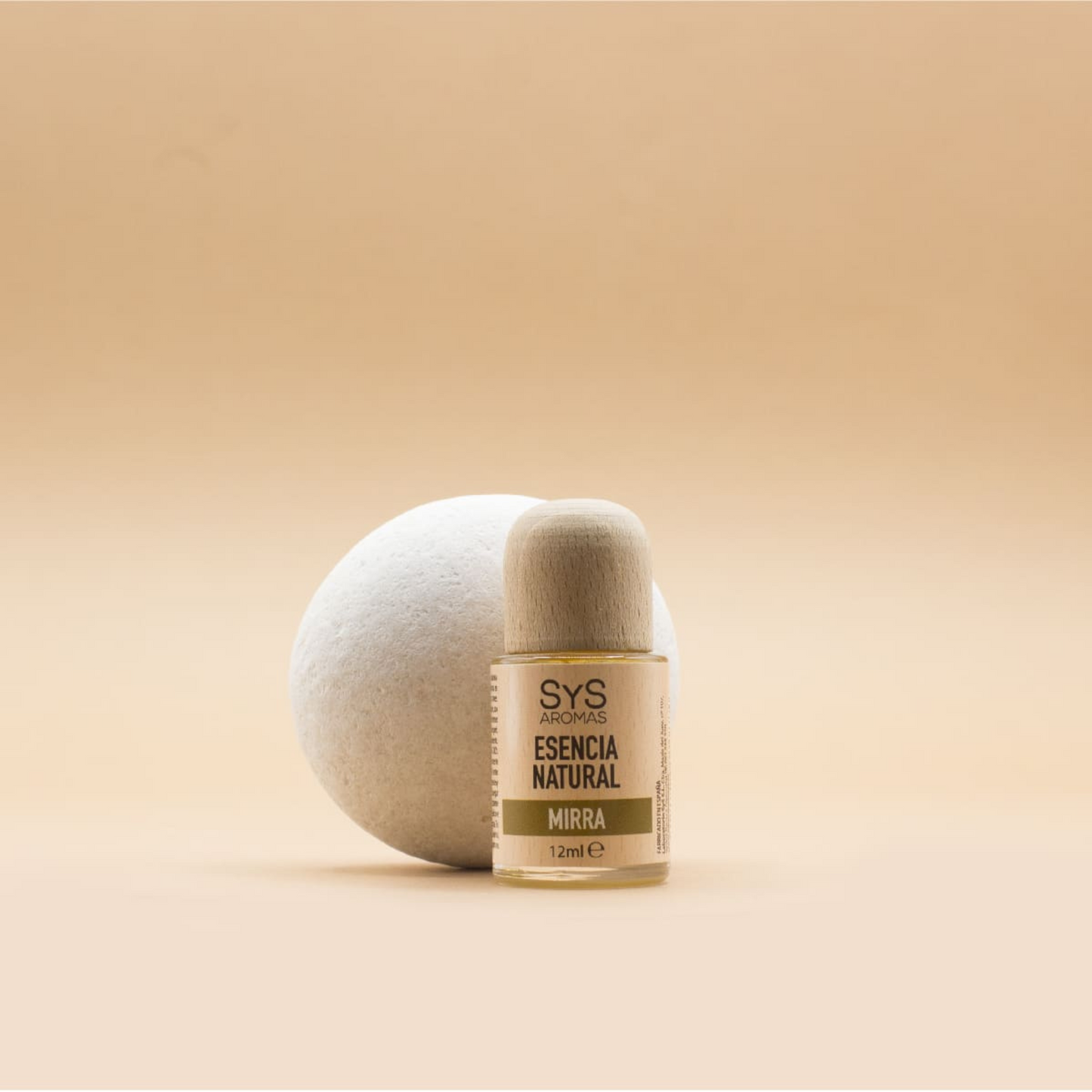 myrrh essence 12ml styled with smooth white zen rock