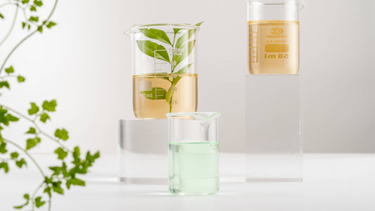 science beakers with oils illustrating natural home scents for relaxation