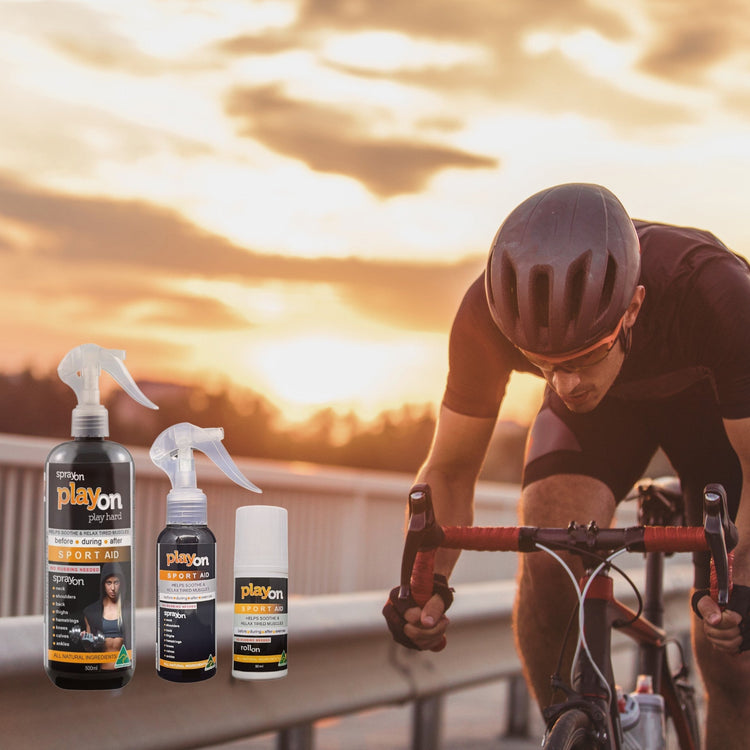 Man riding a bike, using PlayOn SPORT AID for muscle recovery and relief after cycling