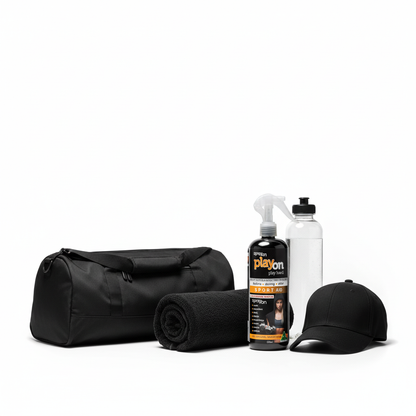 Black duffel bag with a cap, water bottle, towel and playon refill 500ml on a white background.