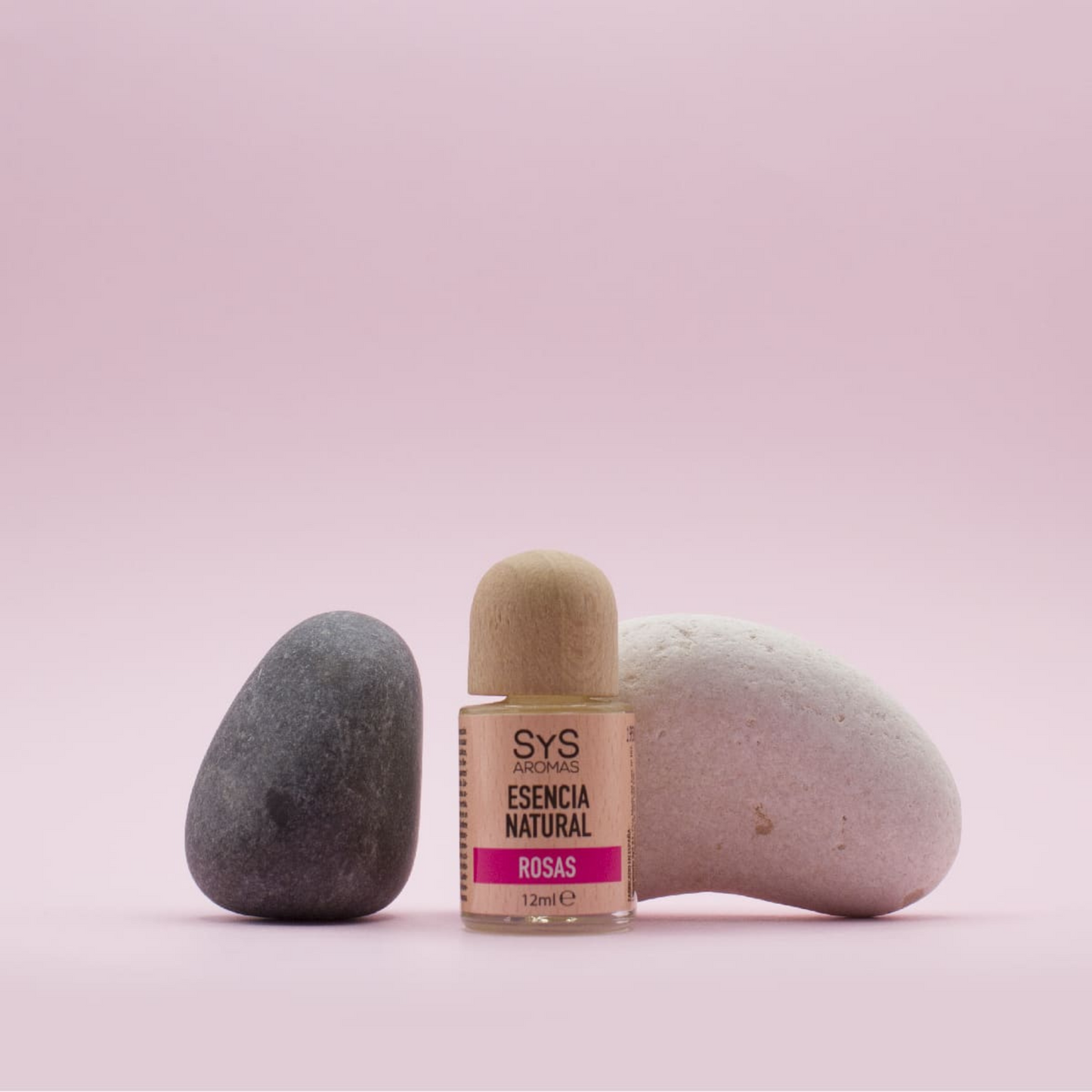 rose essence 12ml styled with two zen rocks