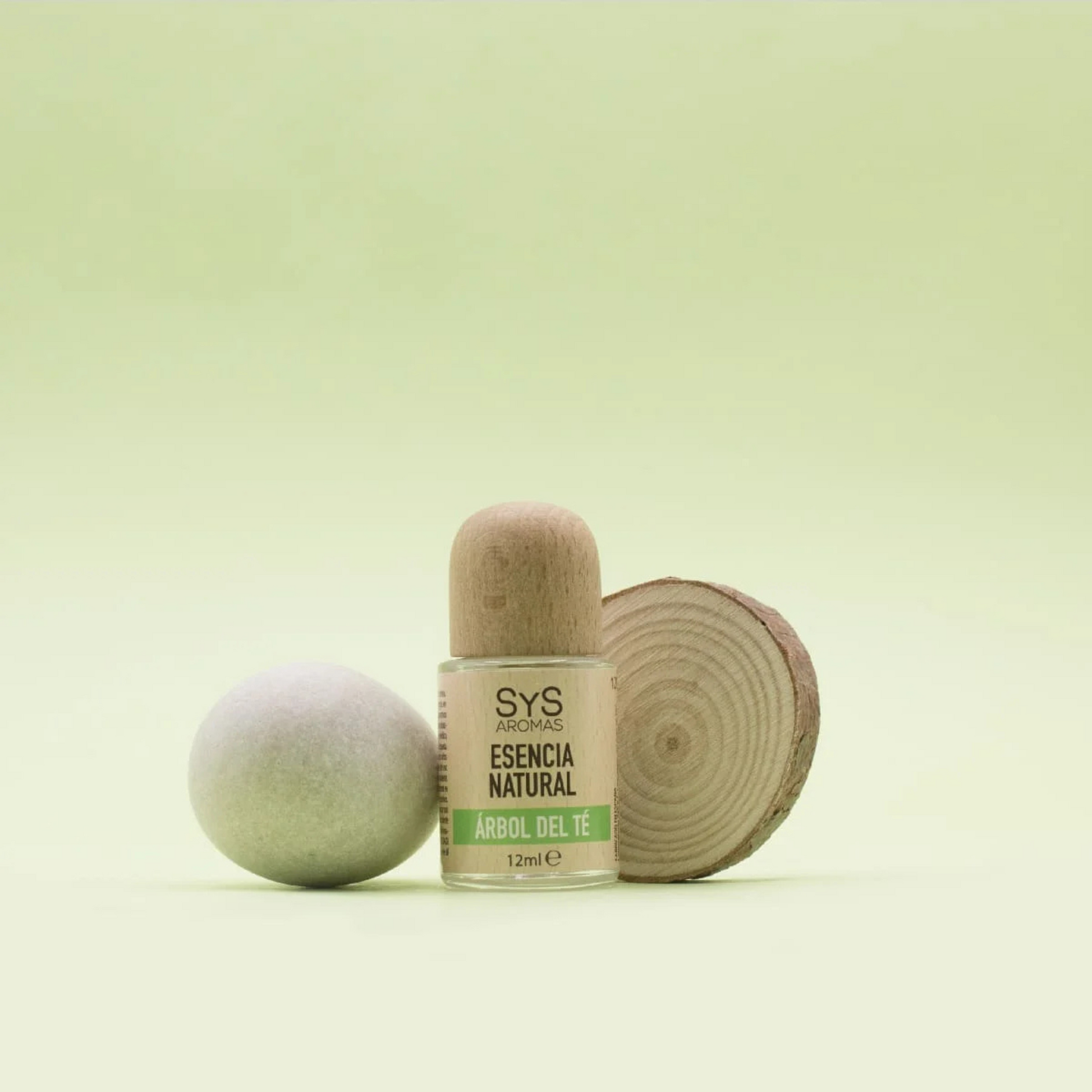 tea tree essence 12ml styled with zen rock and wood